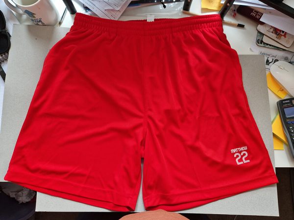 red sports shorts
